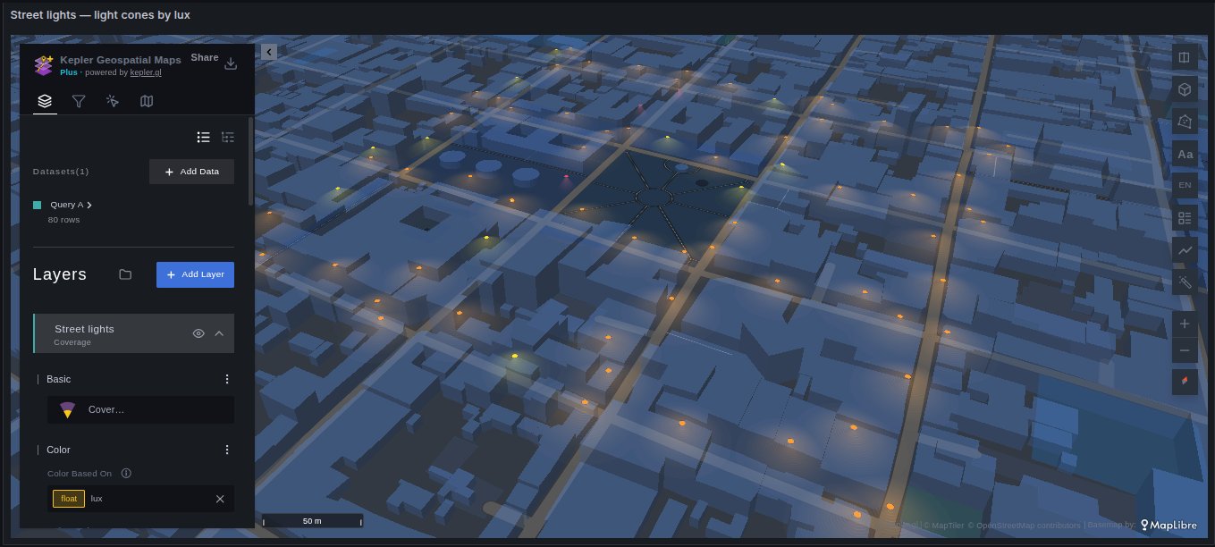 Street lights drawn as 3D light cones coloured by lux, among MapTiler's 3D buildings